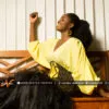 Robe longue brodée, mix de tissus mousseline, pagne tissé et tulles. Couleur Jaune et Noire.