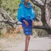 Ensemble tailleur jupe pagne tissé bleu(à brillantine or), brodée + haut en tissu coton batik couleur bleue turquoise et bleue. Avec Foulard et Chapeau brodé assortis.