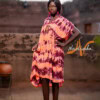 Boubou long brodé en tissu voile de coton teinture orange violet